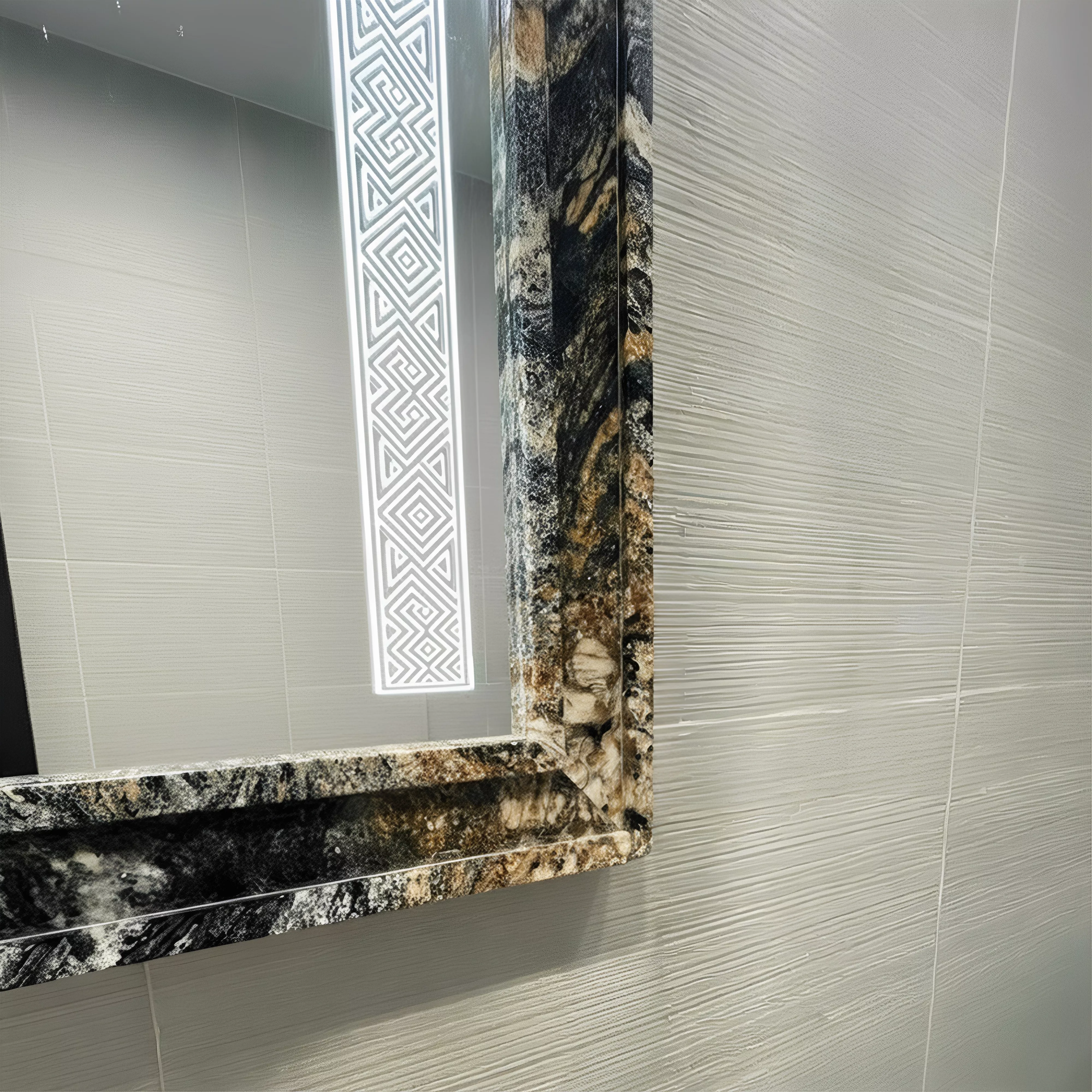 Custom mirror installed in an aesthetic tiled wall seamlessly blends into a stunning bathroom.