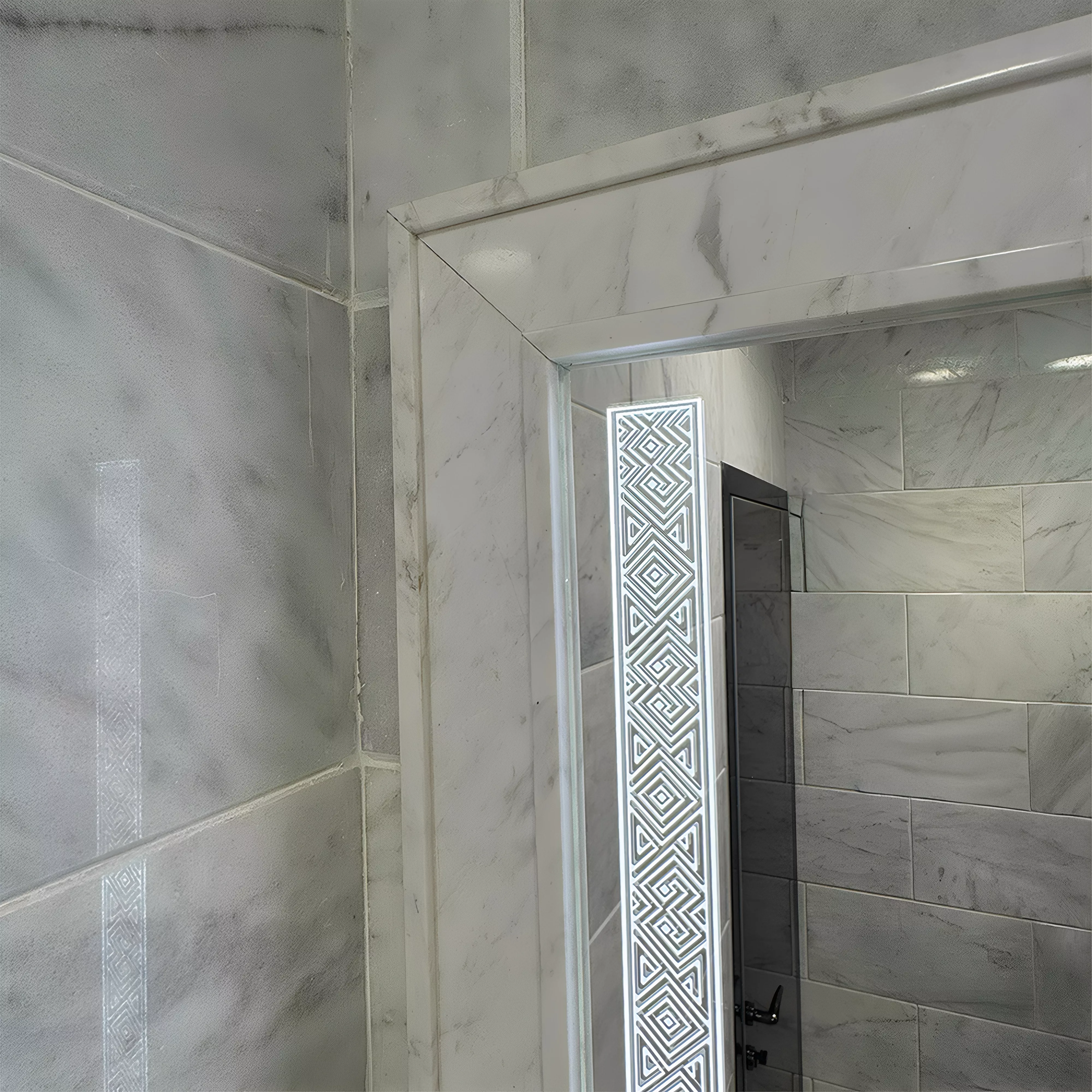 Thumbnail of a frosted-edge LED mirror that fills the space with a gentle glow above a single sink.